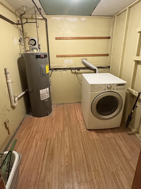 441 Grove Street Braintree, MA 02184 - Photo 8 of 13 a utility room with dryer and washer