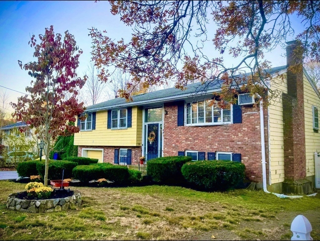 441 Grove Street Braintree, MA 02184 - Photo 9 of 13 a front view of a house with garden