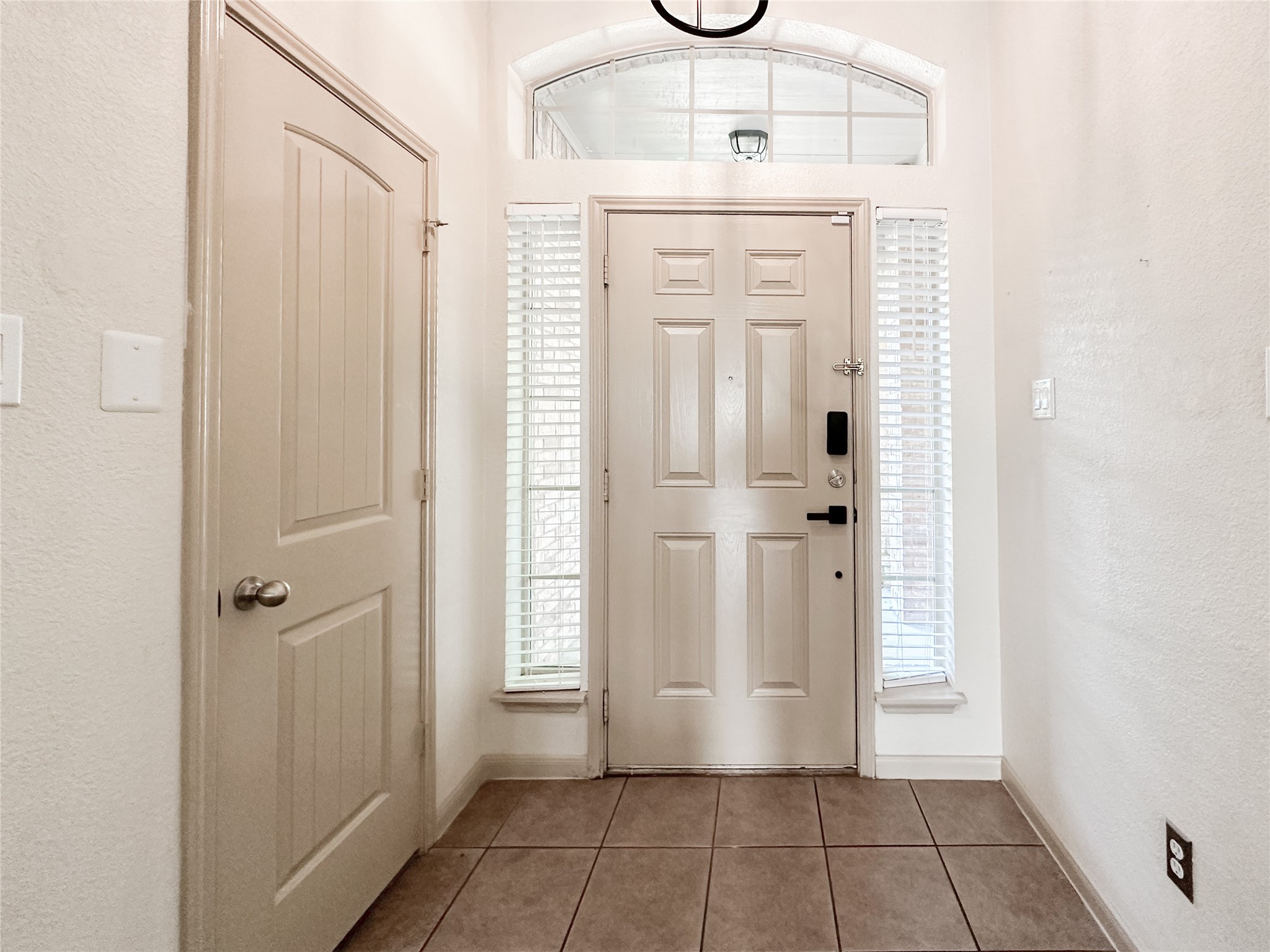 20319 Little Wing Drive Spring, TX 77388 - Photo 7 of 49 a view of a hallway with windows