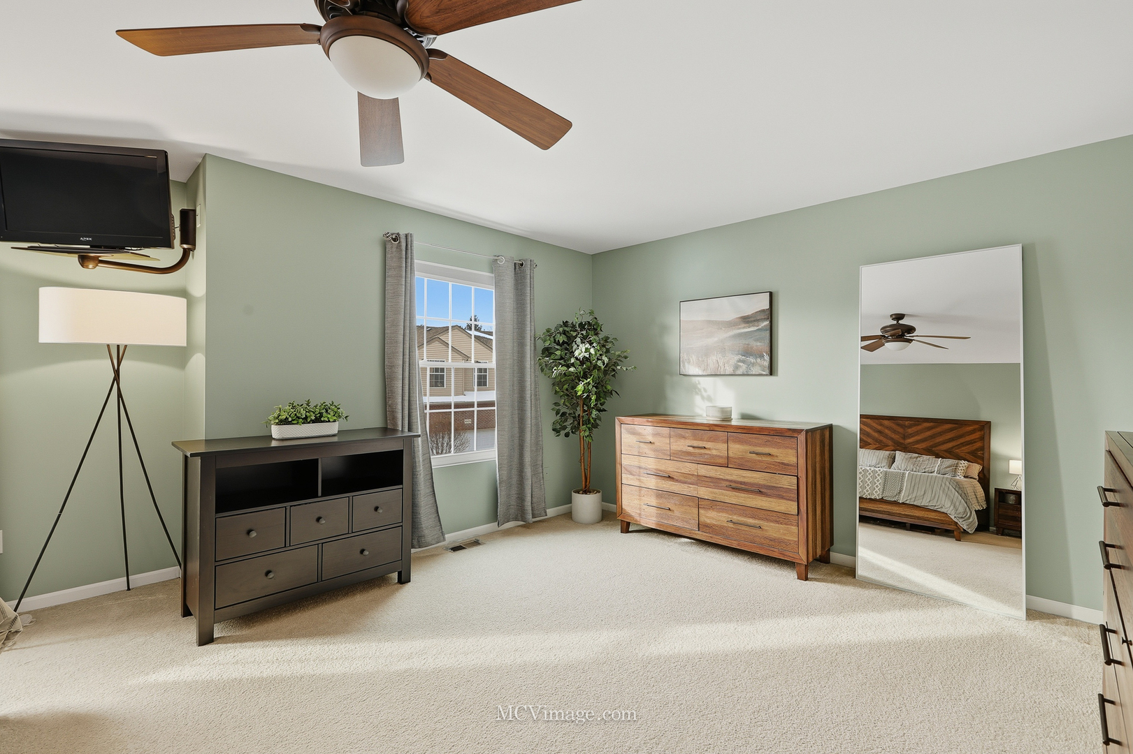 16414 Willow Walk Drive Lockport, IL 60441 - Photo 16 of 30 a room with furniture and a flat screen tv