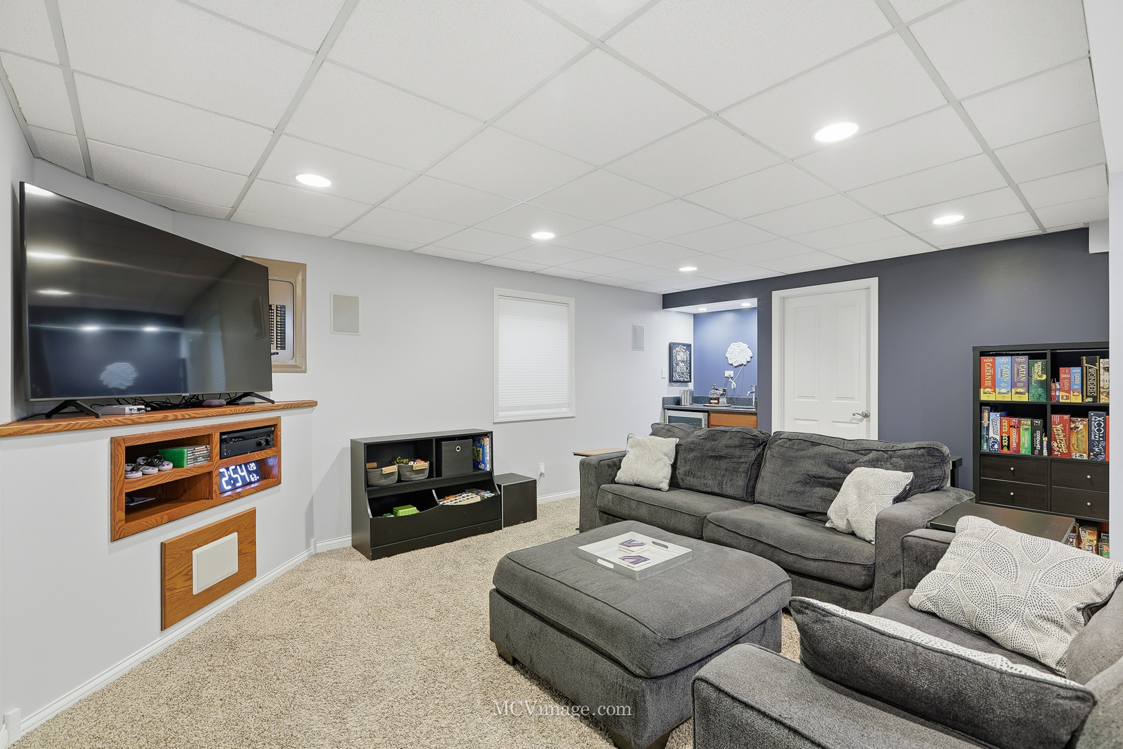 16414 Willow Walk Drive Lockport, IL 60441 - Photo 19 of 30 a living room with furniture and a flat screen tv