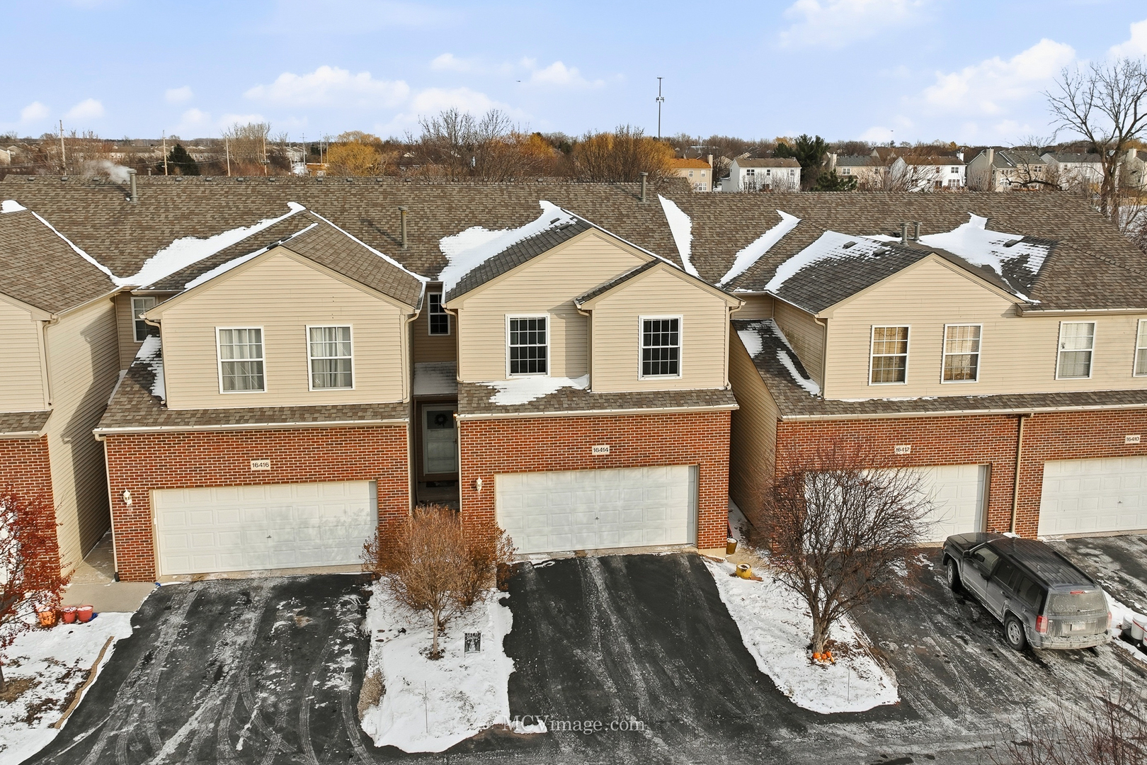 16414 Willow Walk Drive Lockport, IL 60441 - Photo 2 of 30 a front view of a house with a yard
