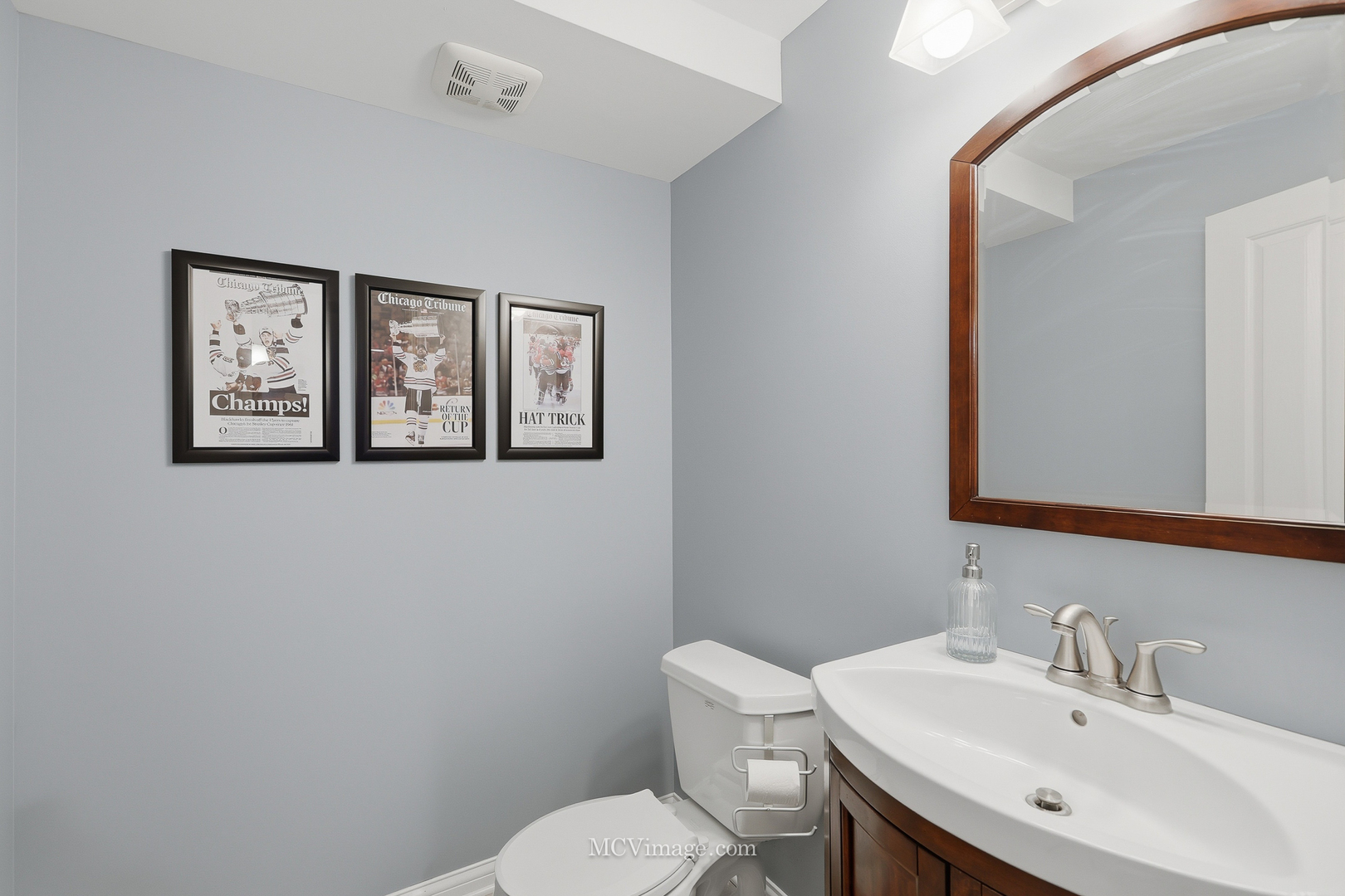 16414 Willow Walk Drive Lockport, IL 60441 - Photo 21 of 30 a bathroom with a toilet sink and mirror