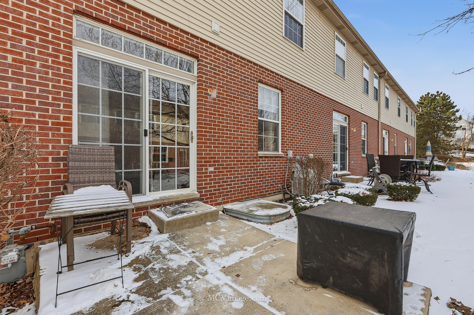 16414 Willow Walk Drive Lockport, IL 60441 - Photo 22 of 30 a front view of a house with outdoor seating