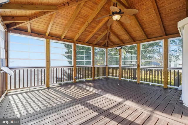 a view of balcony with wooden floor