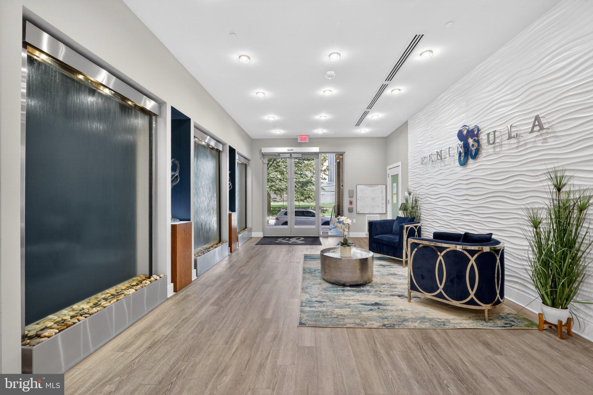 88 V Street Southwest, Unit 213 Washington, DC 20024 - Photo 26 of 26 Serene entrance with calming water features.