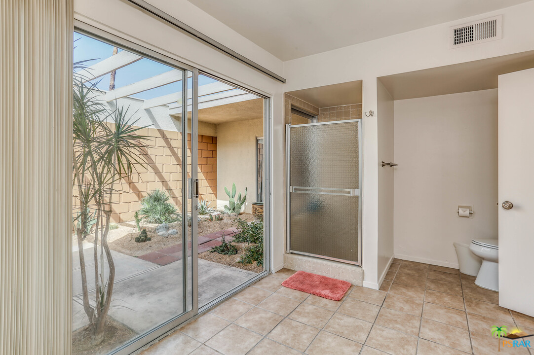 1855 Ramon Road, Unit 3 Palm Springs, CA 92264 - Photo 21 of 38 a bathroom with a shower and a sink