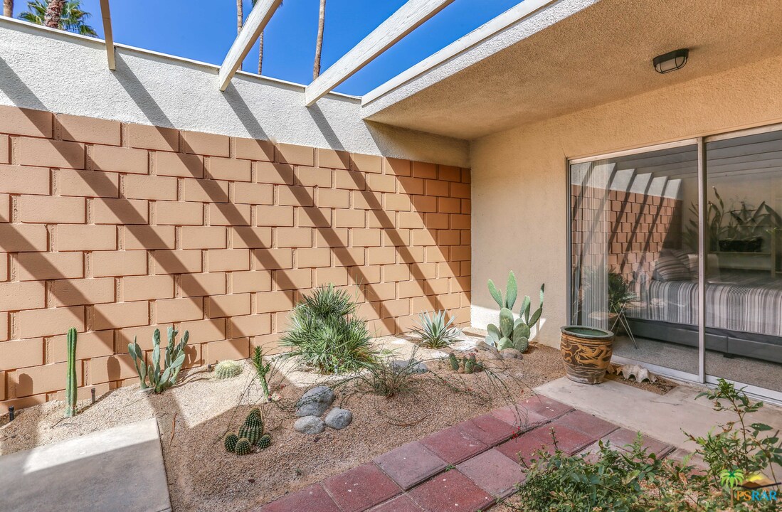 1855 Ramon Road, Unit 3 Palm Springs, CA 92264 - Photo 23 of 38 a view of a entryway door of the house
