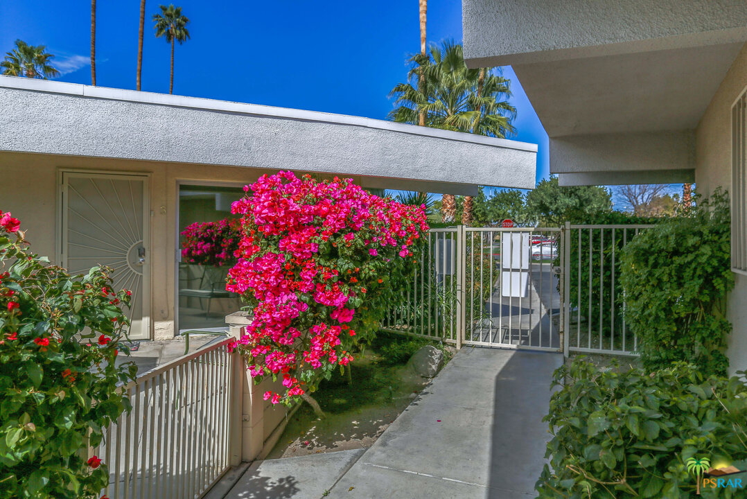 1855 Ramon Road, Unit 3 Palm Springs, CA 92264 - Photo 28 of 38 a view of a house with flower garden