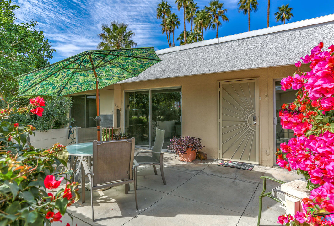 1855 Ramon Road, Unit 3 Palm Springs, CA 92264 - Photo 3 of 38 a view of a house with patio