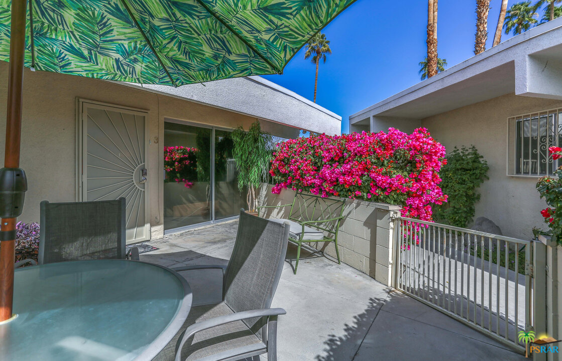 1855 Ramon Road, Unit 3 Palm Springs, CA 92264 - Photo 31 of 38 a view of a house with porch