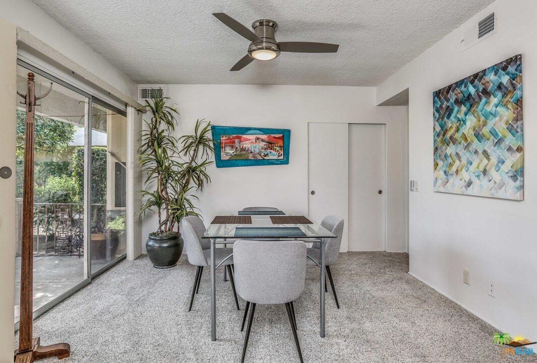 1855 Ramon Road, Unit 3 Palm Springs, CA 92264 - Photo 9 of 38 a dining room with furniture and window