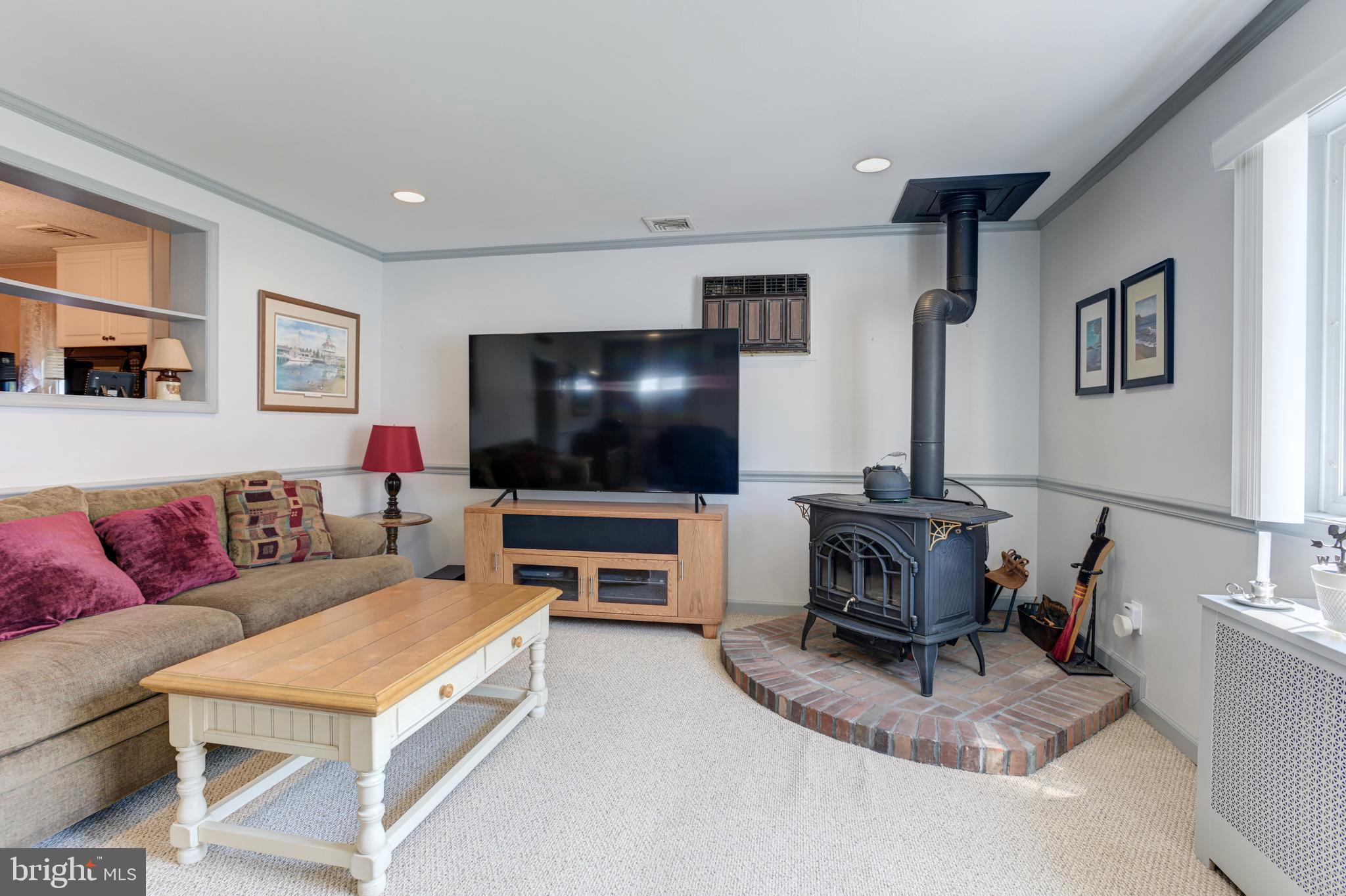 611 Kingston Road Baltimore, MD 21212 - Photo 16 of 44 Wood stove included. AC unit is heat and AC