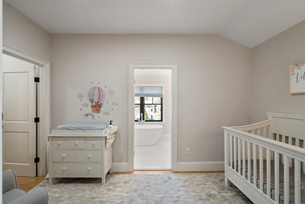7 Massasoit Road Wellesley, MA 02481 - Photo 28 of 42 a view of a bedroom with a window