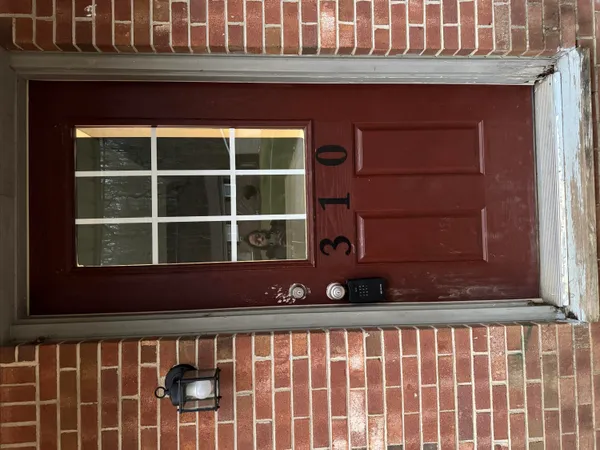 a front view of a house with a window
