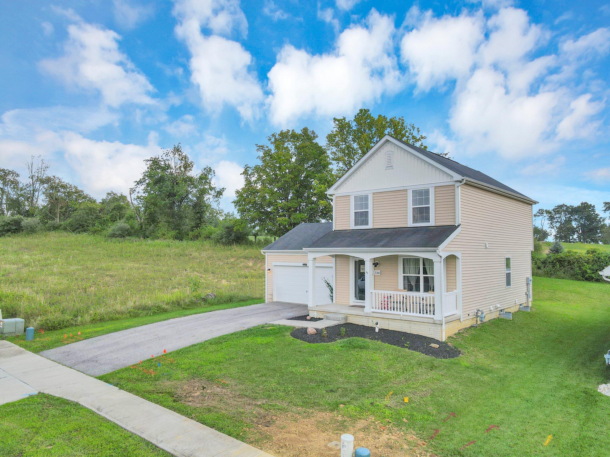 2166 Olde Ridge Avenue Lancaster, OH 43130 - Photo 7 of 31 44-web-or-mls-dji_fly_20230817_170620_5_