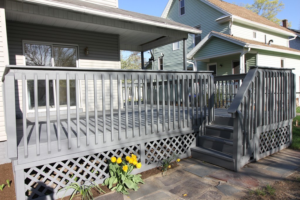 104 Sunapee Street Springfield, MA 01108 - Photo 11 of 11 a view of a small yard and wooden fence