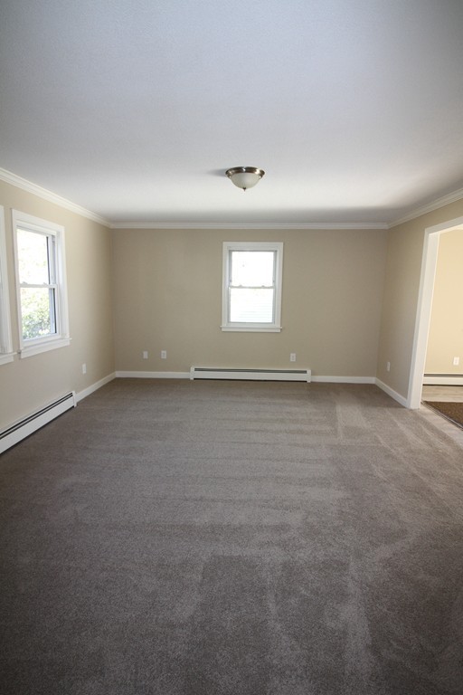104 Sunapee Street Springfield, MA 01108 - Photo 4 of 11 an empty room with a window