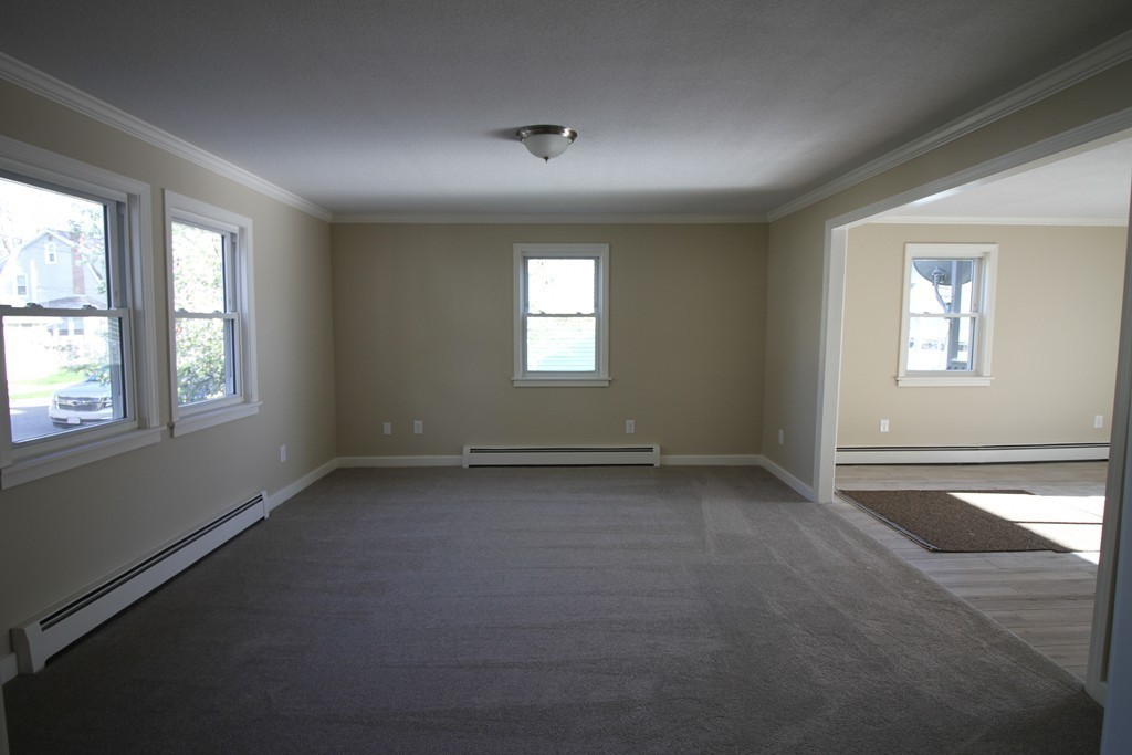 104 Sunapee Street Springfield, MA 01108 - Photo 5 of 11 an empty room with a window