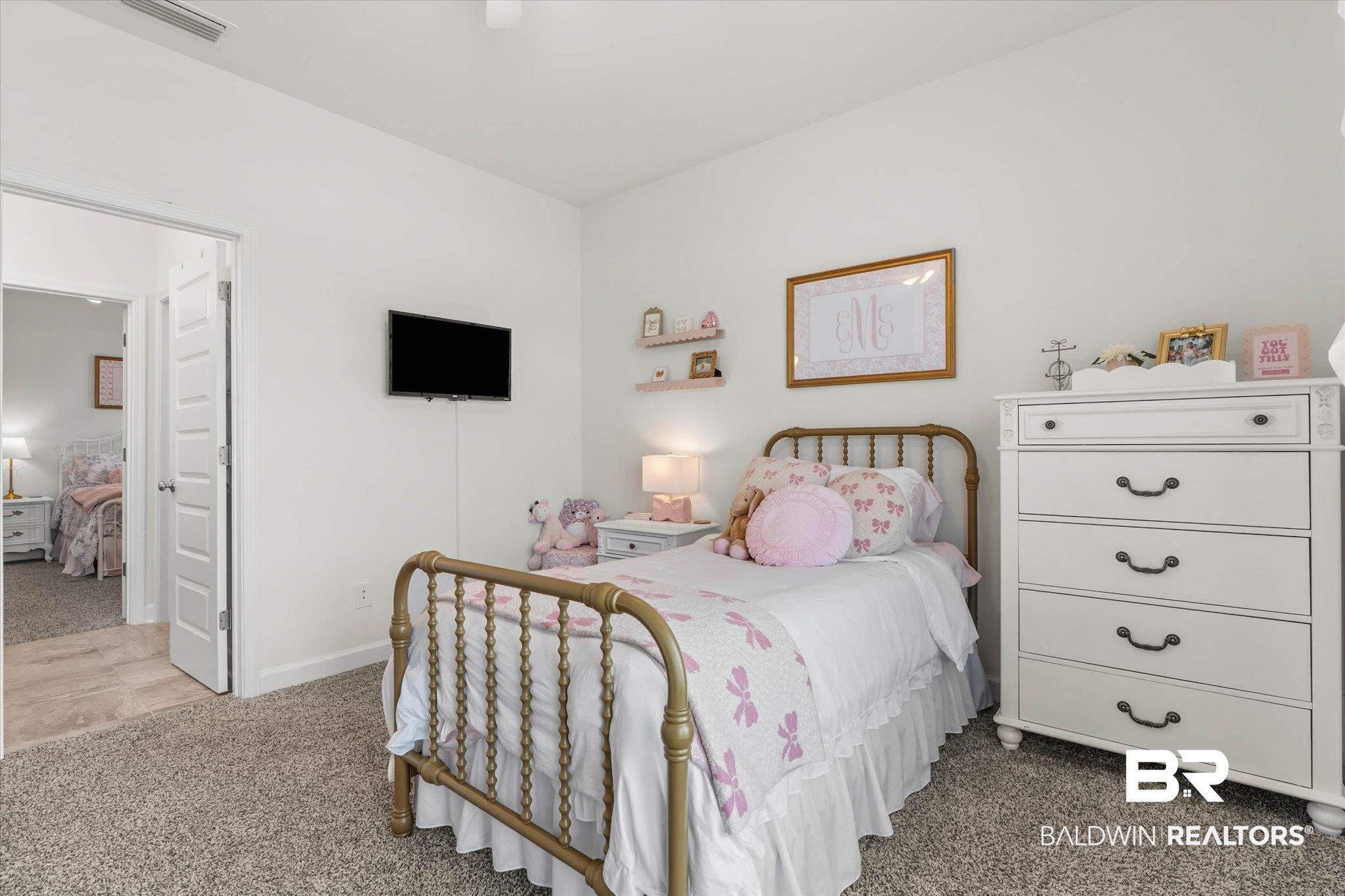 9074 Moses Way Theodore, AL 36582 - Photo 32 of 52 Carpeted room featuring light-colored walls and a wall-mounted television