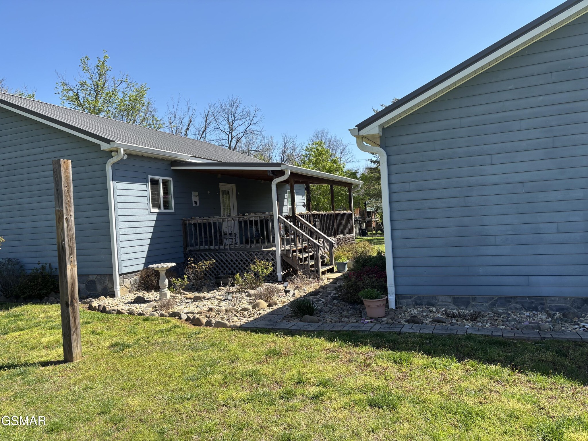 147 Padgett Mill Road Cosby, TN 37722 - Photo 20 of 36 a front view of a house with garden