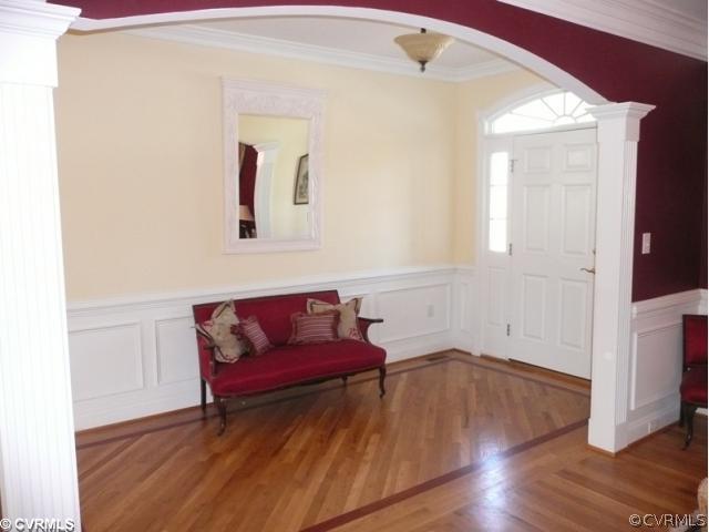 14131 Riverdowns S Drive Midlothian, VA 23113 - Photo 11 of 11 a living room with furniture and a wooden floor