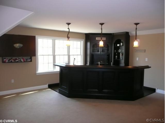 14131 Riverdowns S Drive Midlothian, VA 23113 - Photo 4 of 11 a view of living room with furniture and a flat screen tv