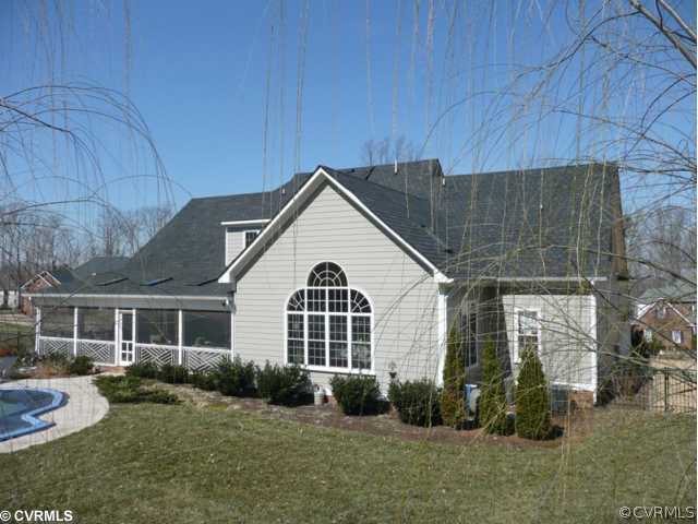 14131 Riverdowns S Drive Midlothian, VA 23113 - Photo 10 of 11 a front view of a house with garden