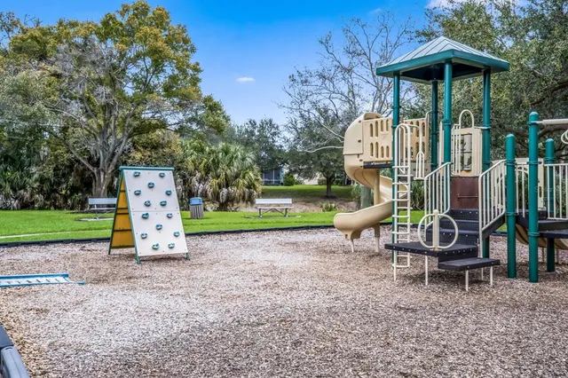 a view of a lake with a yard