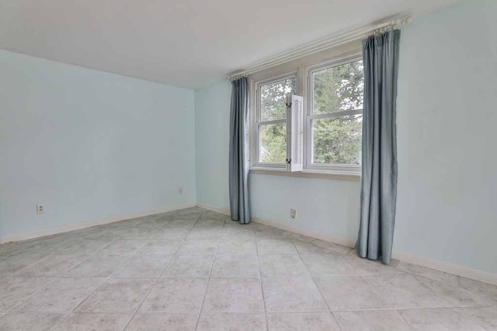 32 Silver Hill Road Maynard, MA 01754 - Photo 11 of 34 an empty room with windows