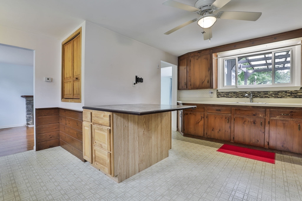32 Silver Hill Road Maynard, MA 01754 - Photo 18 of 34 a view of kitchen with wooden floor and window