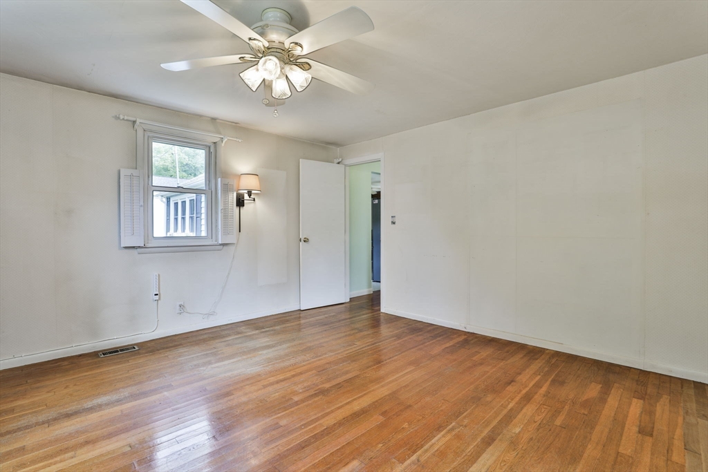 32 Silver Hill Road Maynard, MA 01754 - Photo 24 of 34 wooden floor in an empty room with a window