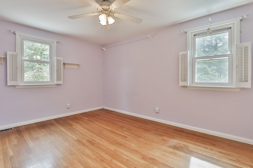 32 Silver Hill Road Maynard, MA 01754 - Photo 26 of 34 a view of an empty room with wooden floor and a window