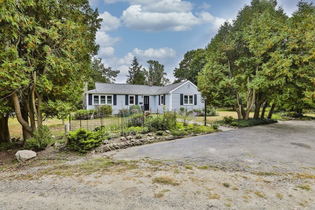 32 Silver Hill Road Maynard, MA 01754 - Photo 30 of 34 a front view of a house with a garden
