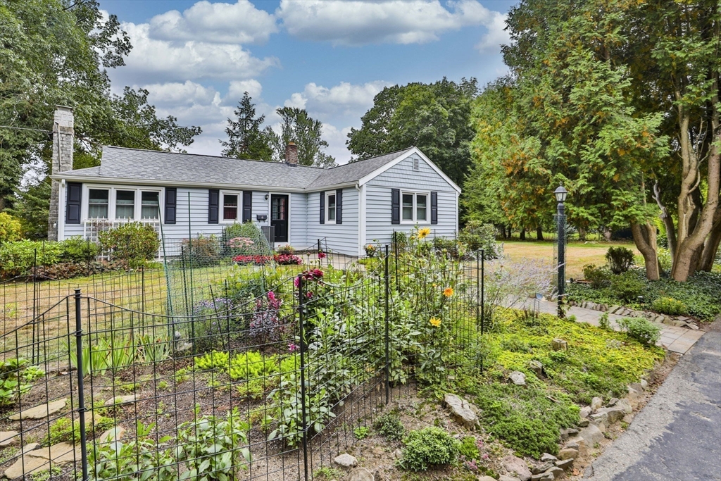 32 Silver Hill Road Maynard, MA 01754 - Photo 3 of 34 a front view of a house with a garden