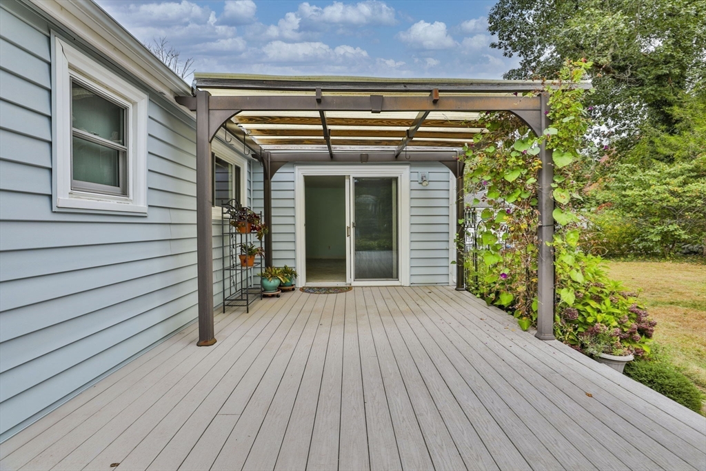 32 Silver Hill Road Maynard, MA 01754 - Photo 34 of 34 a view of a house with a wooden deck