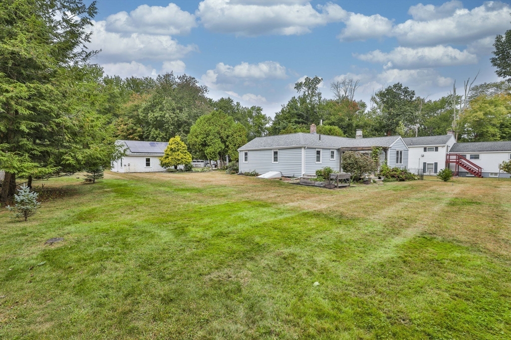 32 Silver Hill Road Maynard, MA 01754 - Photo 6 of 34 a view of a house with a big yard