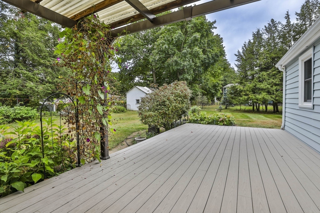 32 Silver Hill Road Maynard, MA 01754 - Photo 8 of 34 a view of balcony with wooden floor and fence