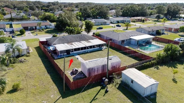 a view of a swimming pool with a patio