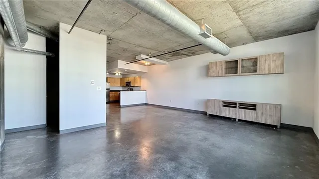 a view of a livingroom with wooden floor