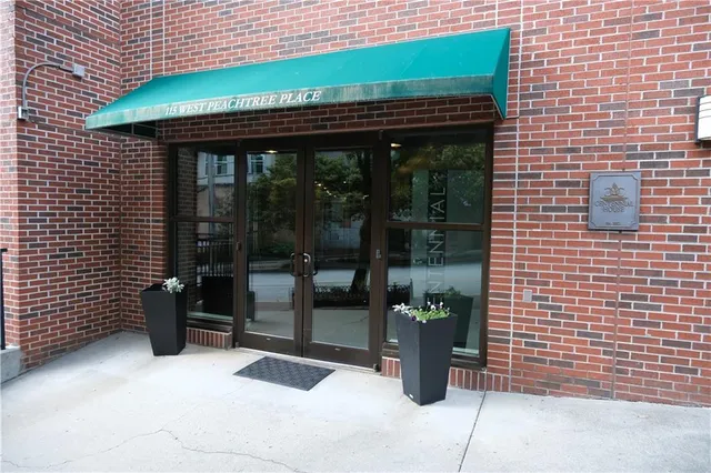 a front view of a house with outdoor space