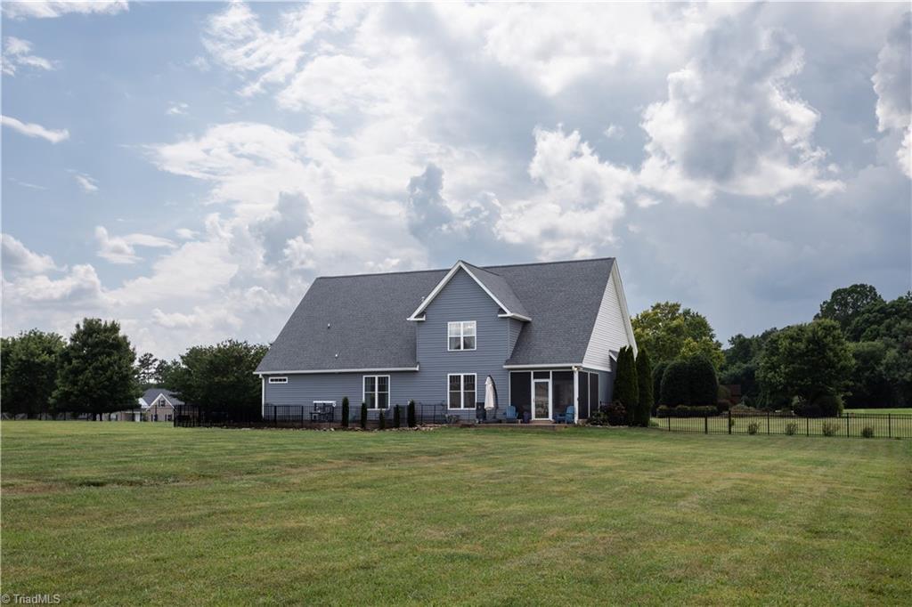 393 Scout Road Lexington, NC 27292 - Photo 46 of 47 This yard is fenced! Dogs, kids, friends, flowers?.... Need room for your pups to run? This is it!!
