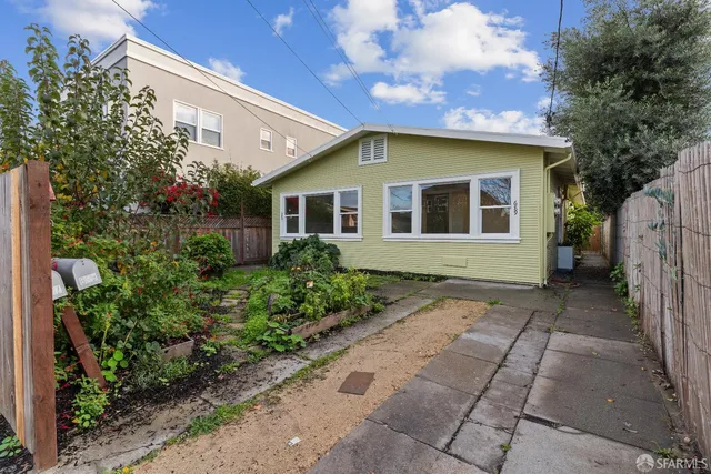 a front view of a house with garage
