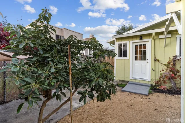a front view of a house with garage