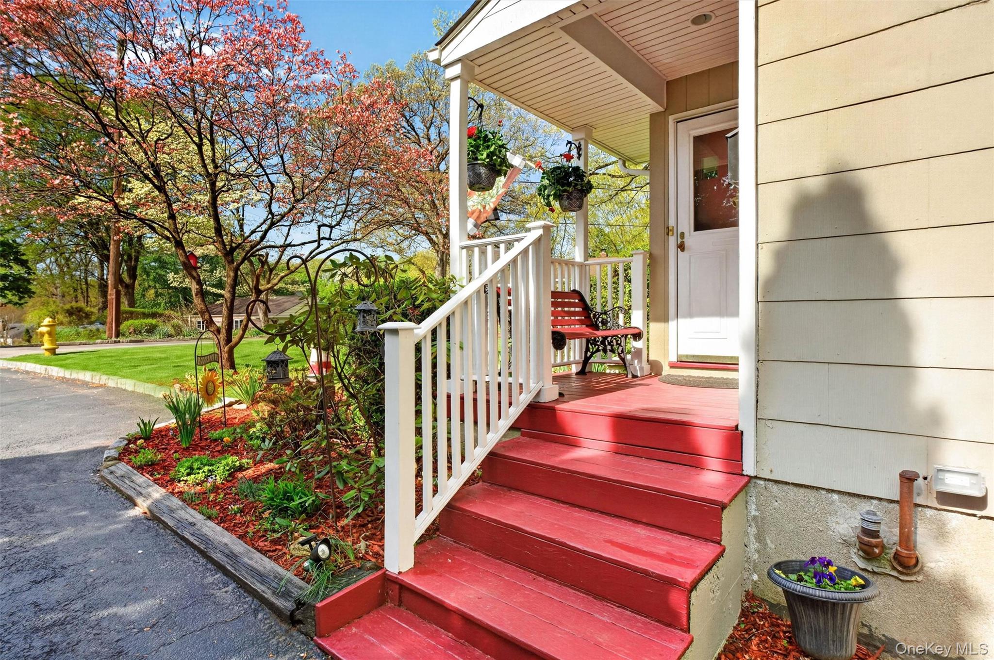 25 High Road Montrose, NY 10548 - Photo 4 of 42 Bordered by lovely flower beds.