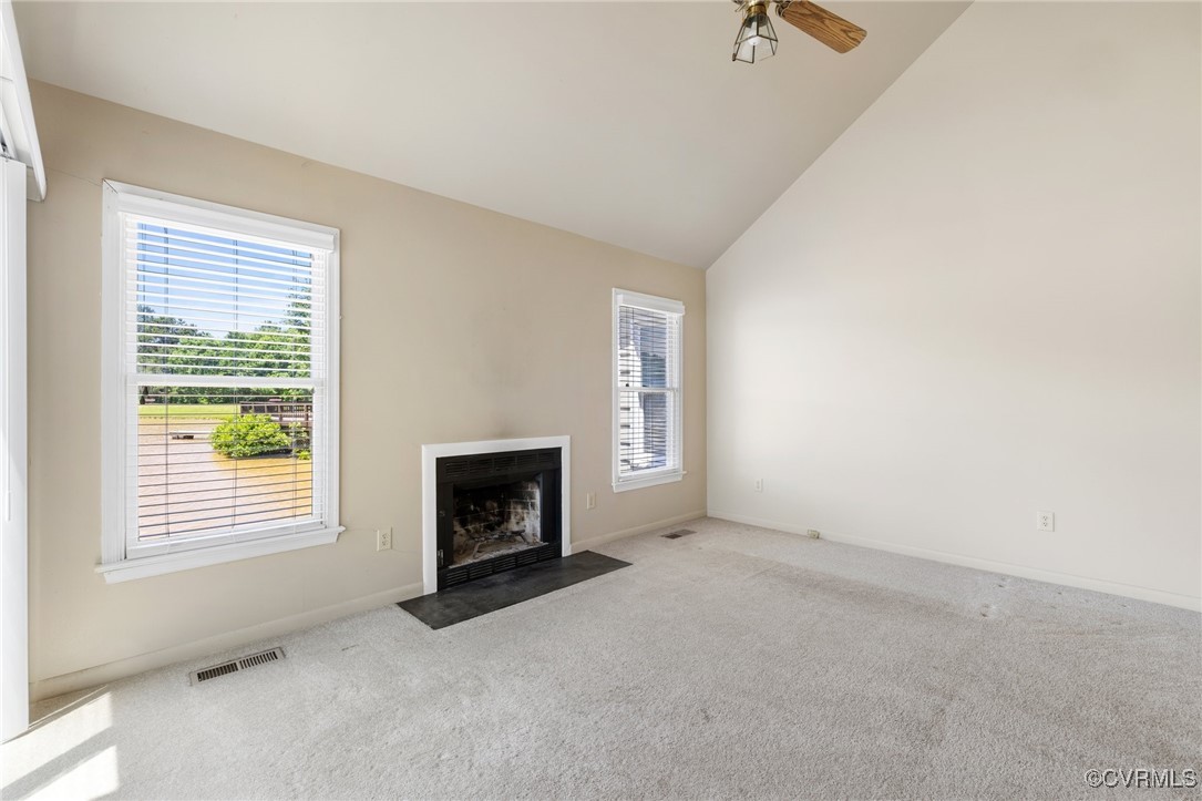 14707 Inlet Court Chesterfield, VA 23832 - Photo 8 of 19 Vaulted Ceiling with ceiling fan, fireplace and wa