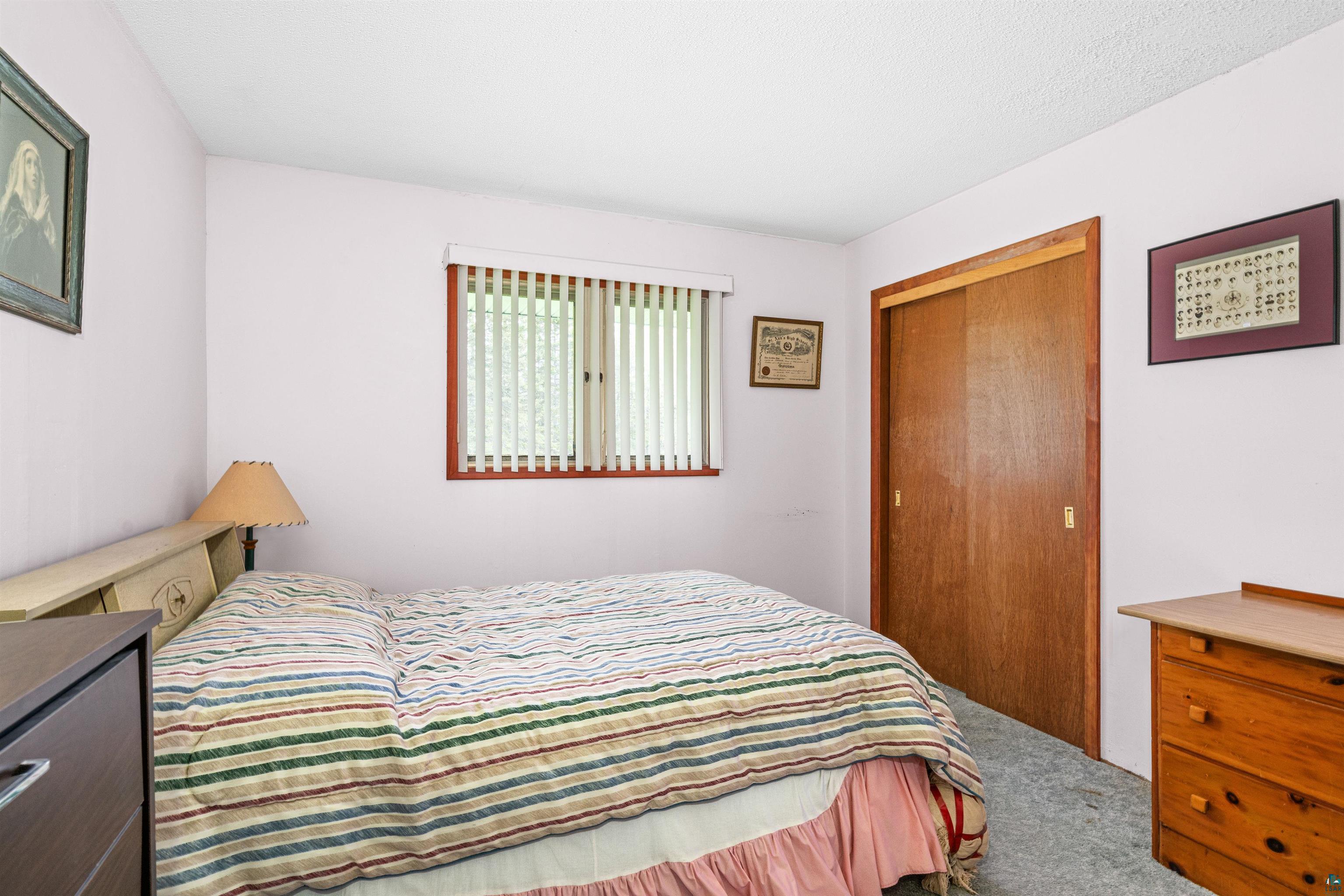 6242 State Highway 1 Silver Bay, MN 55614 - Photo 12 of 43 Bedroom featuring carpet