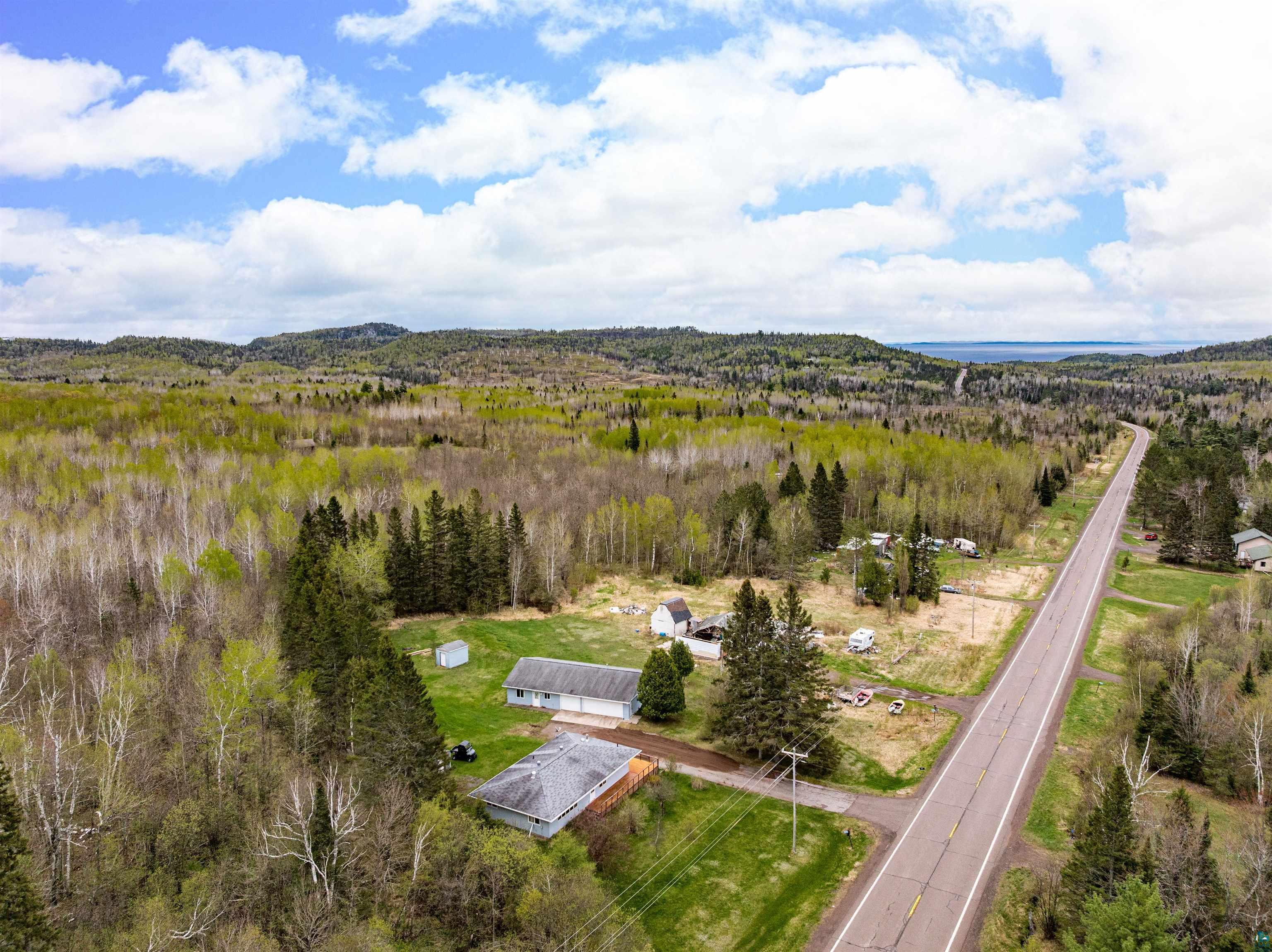 6242 State Highway 1 Silver Bay, MN 55614 - Photo 28 of 43 Aerial view of property's location featuring a forest