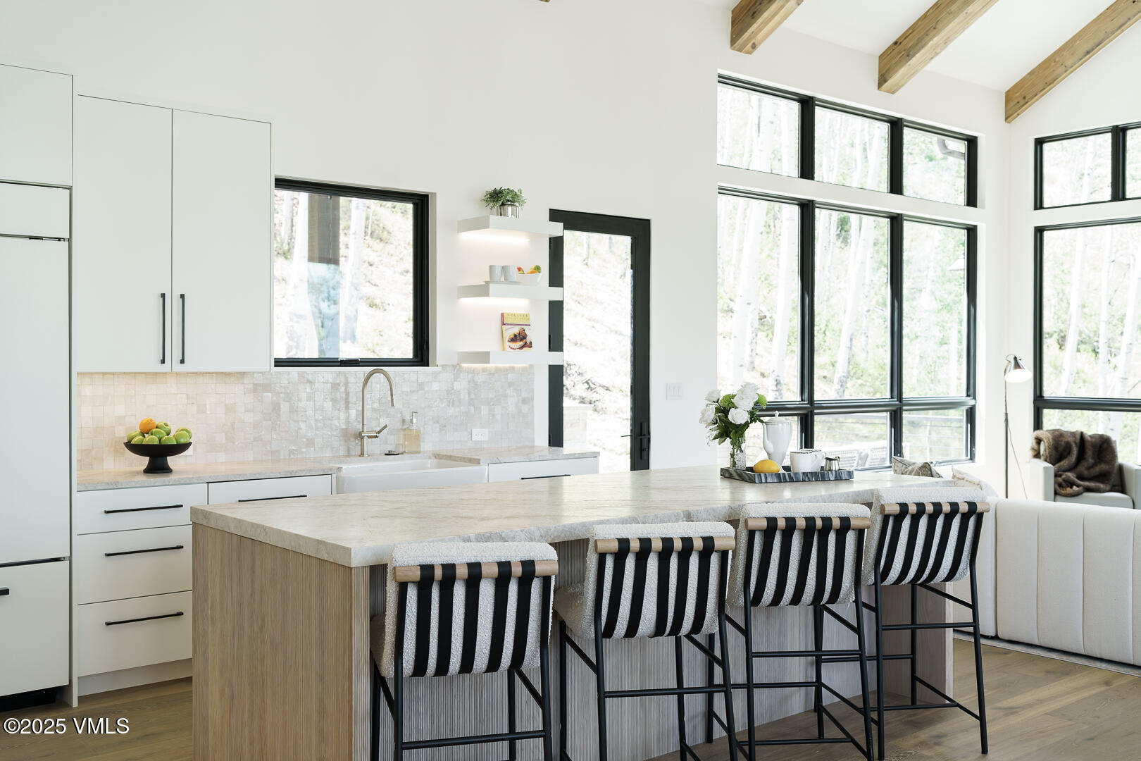880 Forest Trail Edwards, CO 81632 - Photo 20 of 119 a kitchen with a window a sink and a dining table