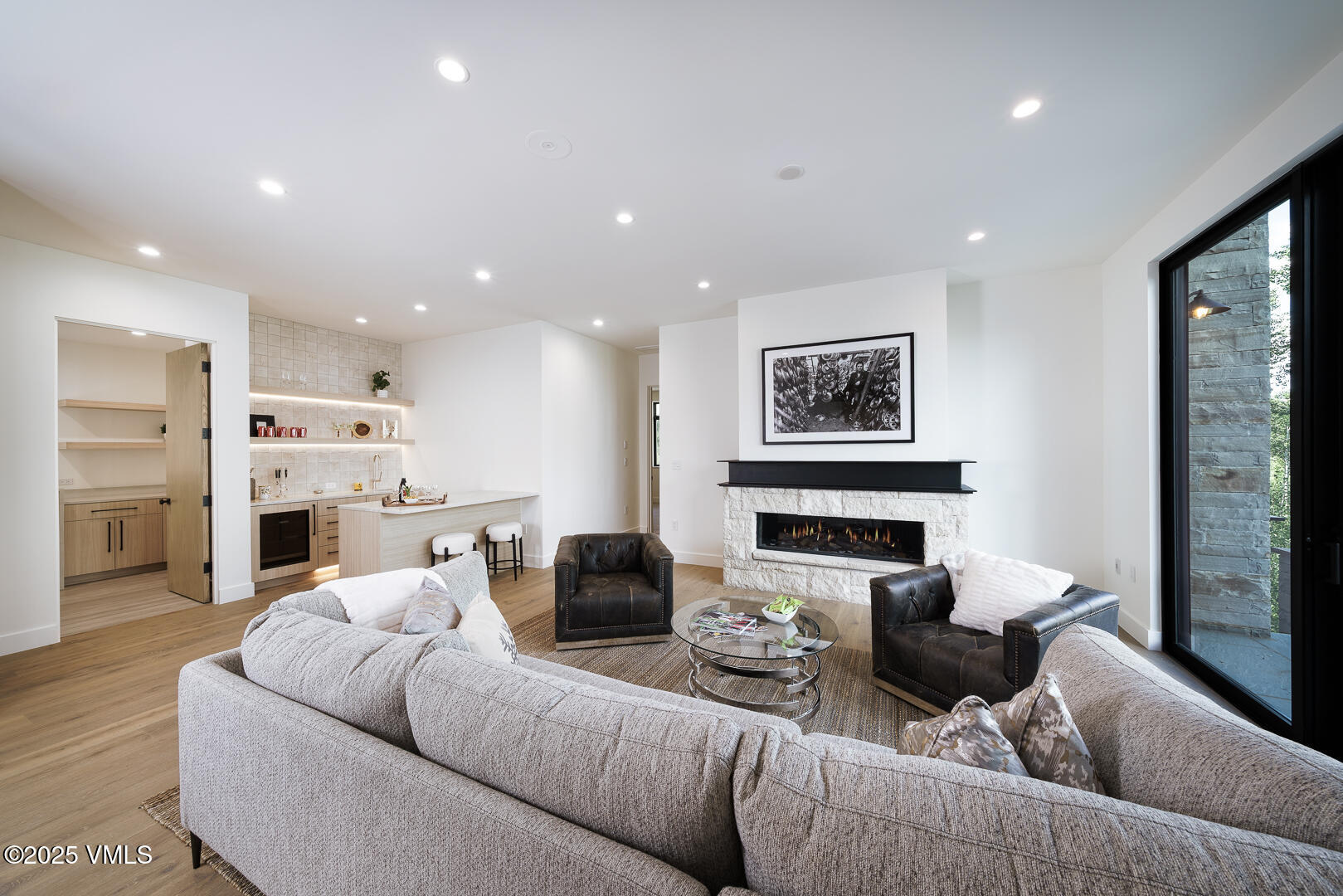 880 Forest Trail Edwards, CO 81632 - Photo 82 of 119 a living room with furniture fireplace and a large window